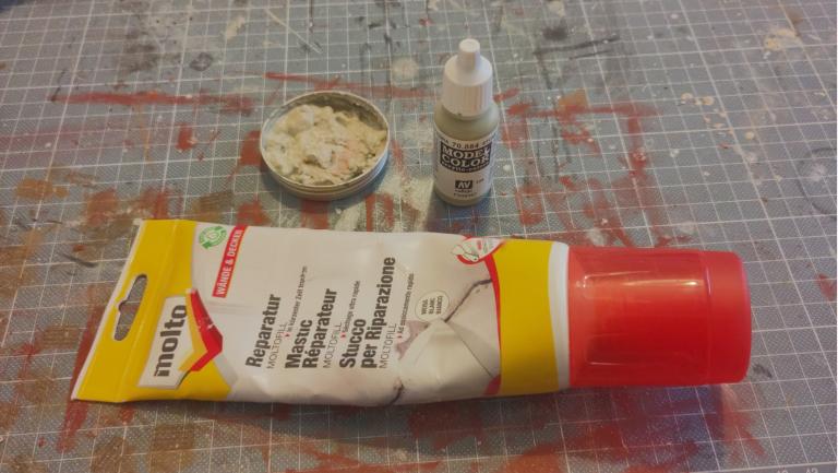 Mix together Moltofill, Stone Grey and water